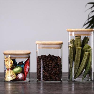 China Wholesale Freshness Preservation Handmade High Borosilicate Glass Sealed Food Cereal Storage Containers Cans Glass Jar With Bamboo Lid for sale