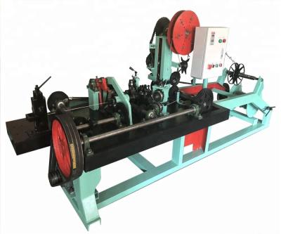 China cheap price double strand barbed wire fence making machine en venta