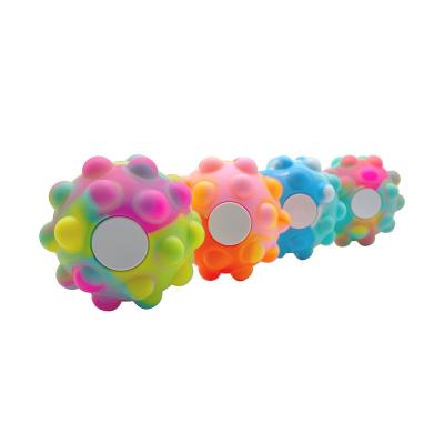 China Relief Effort Squeeze Jumping Ball Jumping Compression Toy Rainbow Color Pop Bubble Sensory Spinner for sale