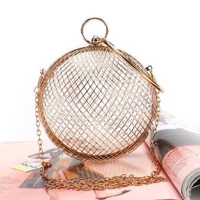 China Fashoion fashion retro muyer bolso de noche ladies ball around rhinestone purse party dinner metal hollow clutch bags for women for sale