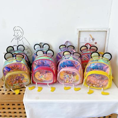 China Kindergarten children's design school bag backpack boys and girls new waterproof children's new transparent jelly backpack kids laser schoolbag for sale