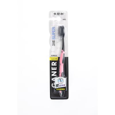 China Light Weight Comfortable Soft Handle Carbon Bristle Toothbrush Used For Adult for sale