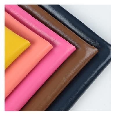 China Waterproof Shiny Oily Luster Synthetic Leather 0.8mm Thickness For Suitcase Handbag Sofa Saddle Table Mat Fine Grain Leather Material for sale