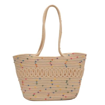 China Viable Women's Shoulder Bag Hollowed Out Cotton Yarn Hand Woven Bag With Large Capacity French Seaside Vacation Beach Bag for sale