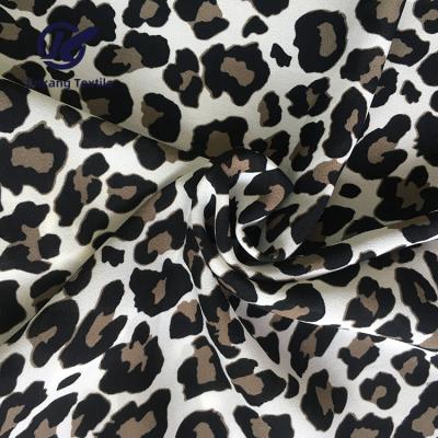 China Factory fashion design polyester leopard water print foam crepe anti-static chiffon fabric for lady girl dress blouse for sale