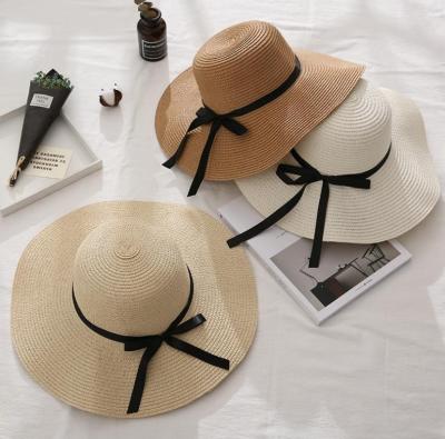 China Wholesale Picture Women Sunproof 100% Sun Female Paper Foldable Soft Hats For Lady Summer Bowknot Ribbon Beach Straw Hat for sale