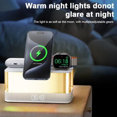 China Colorful Lights Wireless Charger for iPhone iWatch and AirPods with Bluetooth Speaker à venda