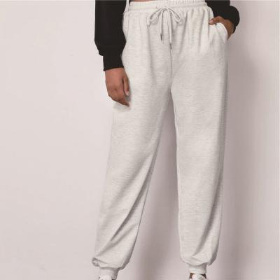 China 2021 QUICK DRY casual casual sweatpants solid color pants elastic-tie sweatpants with leg belt for women for sale