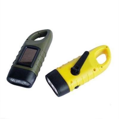 China Outdoor Solar Plastic Hand Crank Emergency LED Supply Mini Torch Gift Products for sale