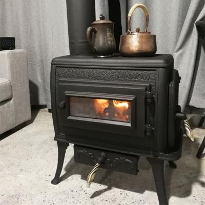 China Asian Fireplace China Fire Real Burning Free Standing Cast Iron Wood Stove for sale