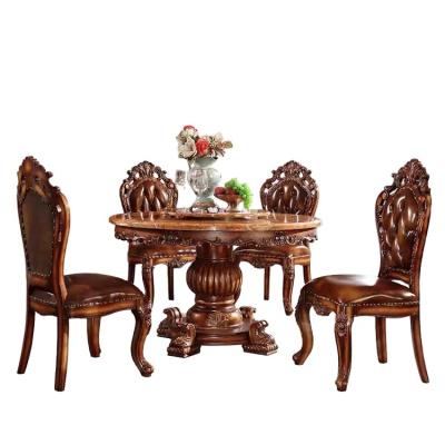 China Hot Sale Luxury Round Shape Solid Wood Dining Table With Round Marble Top Hand Carved Dining Set for sale