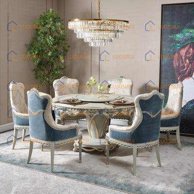 China Hot Selling European Wooden Round Dining Set Carved Fabric Dining Chair Dining Table With Six Chairs for sale