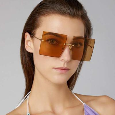 China Fashion Sunglasses Shape Cheap Popular Women Fit Large Oversized Rimless Sun Glasses Frames Mirror Sun Glasses for sale