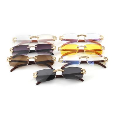 China Trendy Women Sunglasses 2021 Fashion Rimless Square Rectangle Rhinestone Small Frames Wooden Temples Sun Glasses With Diamonds for sale