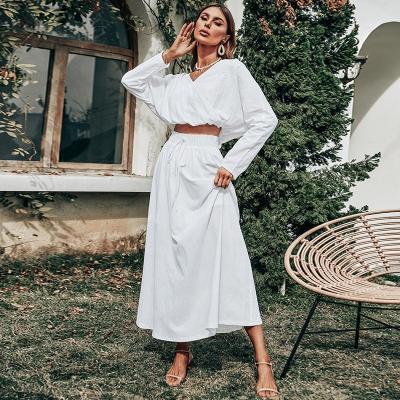 China 2022 New Summer Women's Two-Piece Long V-Neck Fashion Casual Breathable White Sheathed Upper Skirt Suit for sale