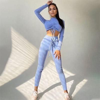 China 2021 Autumn New Style Solid Color Anti-Static Long Sleeve Suction Rope Wrinkle Sports Crop Top Yoga Pants Women Two Piece Set for sale