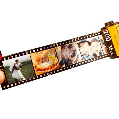 China Decorationand Wholesale Kpop Customized Multiple Photo DIY Menorial Personalized Photo Movie Roll Key Chain As Gift for sale