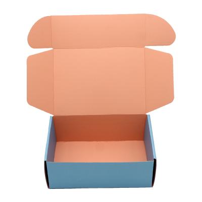 China Recyclable Stock Gift Corrugated Box Christmas Gift Corrugated Color Mail Packing Box for sale