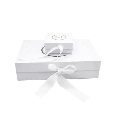 China Recyclable Custom Matte White Ribbon Gift Folding Cardboard Boxes With Sepaprate Lid for sale