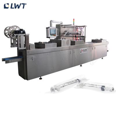 Chine Automatic Stretch Film Thermoforming Pack Syringe Vacuum Packaging Machine à vendre