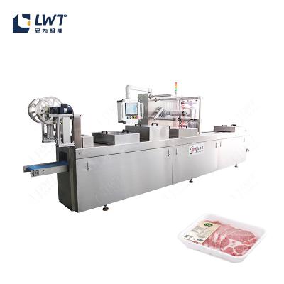 Cina Macchine di imballaggio della pelle a vuoto per carne Stretch Film Vacuum Sealer per la linea di imballaggio in vendita