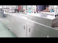 Desiccant stretch film vacuum packaging machine