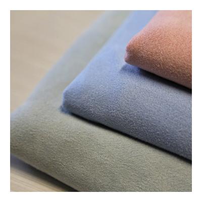 China Anti-pulling four side super elastic suede fiber synthetic suede artificial leather clothing toy sofa fabric for sale