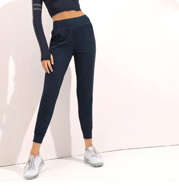 China Women Gym Breathable Casual High Waist Running Connection Breathable Sports Pants With Luminous for sale