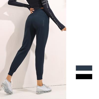 China Women Gym Breathable Casual High Waist Running Connection Breathable Sports Pants With Luminous for sale