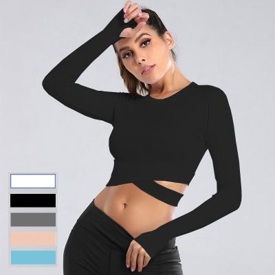 China Breathable Custom Cross Crop Yoga Wear Gym Long Sleeve Top Fit Design Women Sport Shirts With Finger Holes for sale