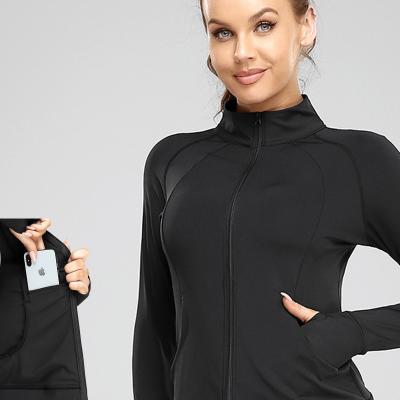 China Breathable Women Long Sleeve Finger Holes Gym Fitness Zipper Tight Yoga Sport Jacket With Phone Pocket for sale