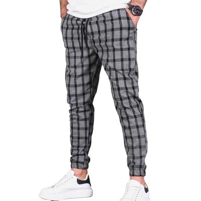 China 2023 Wholesale Custom Men's Fashion Leisure Package Anti-Wrinkle Slim Comfortable Plaid Leisure Jogging Pants for sale