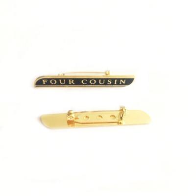 China custom shiny gold plated 3D metal badge with safety pin for sale