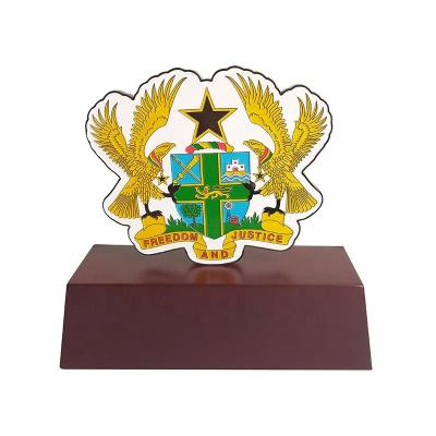 China UAE High Quality Custom Logo Wooden Ghana Stand Metal Trophy for sale