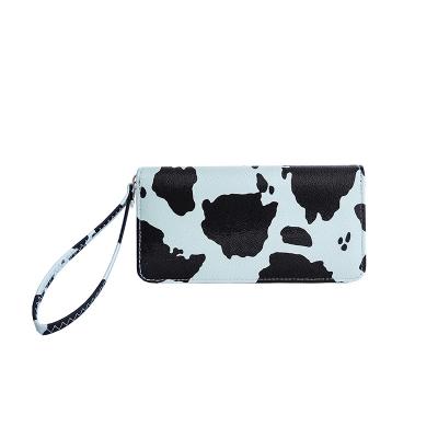 China Anti Theft Animal Cow Printed Mini Pu Wristlet Wallets Purse Bag For Women for sale