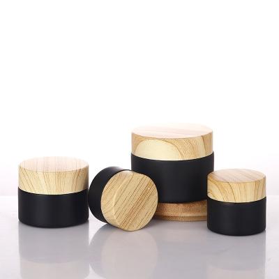 China Cheap Personal Care Bamboo Cosmetic Packaging Cosmetic Face Cream Container With Bamboo Lids for sale