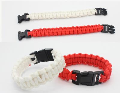 China Outdoor Camping Hiking Wholesale High Quality Woven Color Sports Bracelets Survival Paracord Travel Wristband for sale