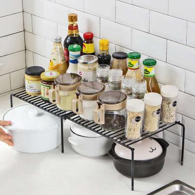 China Convenient Iron Rack Retractable Kitchen Rack Bathroom Finishing Seasoning Rack for sale