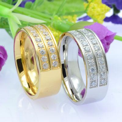 China Romantic CZ Rings Gold Stainless Steel Engagement Couples Wedding Band for sale