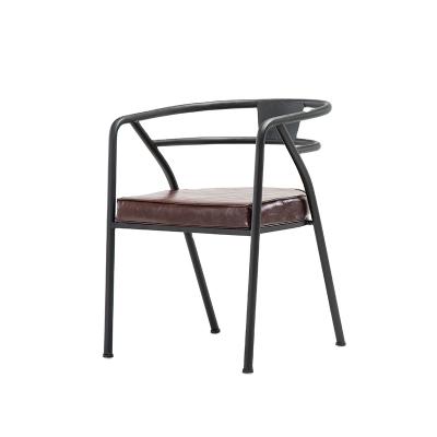 China Modern Modern Furniture PU Industrial Leather Dining Iron Chair With Black Metal Legs for sale