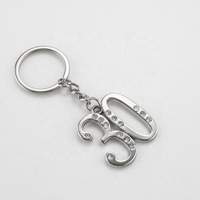 China Gift Makers Metal Tag Zinc Alloy Custom Personalized Key Chain Number Shiny Keychain for sale