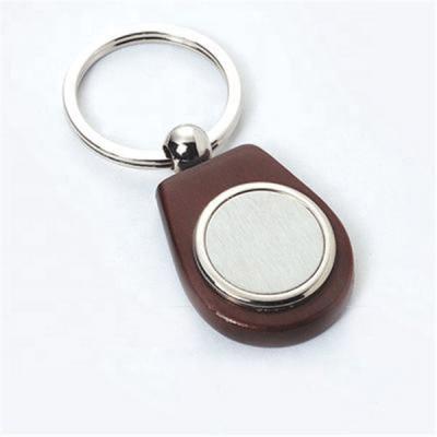 China Custom DIY Gifts Key Chain Key Indicator Handmade Wooden Laser Masks Metal Key Chain With Split Key Ring for sale