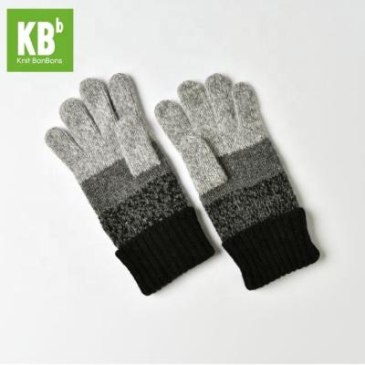 China Softly 2019 Wholesale Fashion Men Women Gray Designer Lambswool Wool Fingerless Comfortable Gloves Knit Pom Pom Winter Whole Gloves for sale