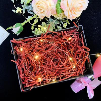 China Wholesale Recycled Materials New Arrival Shiny Durable Bright Decoration Filler Luxury Bling Raffia Shredded Paper for sale