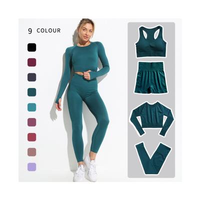 China Breathable Sports Suit Seamless Hip Lift Fitness Set Woman Tight Plain Color Yoga Suit Female Womens Gym Sets Ribbed Seamless Yoga Set for sale