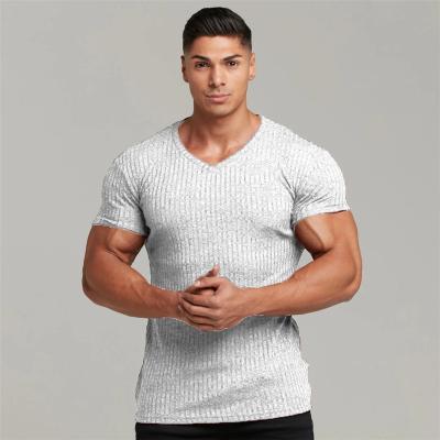 China Summer Leisure Anti-wrinkle Sports Fitness Shorts Super Tight Sleeve Top Men's Breathable Slim Sweater Elastic V-Neck T-Shirt for sale