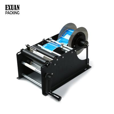 China EXUAN-MT-50 Small Manual Food Labeling Machine Around Wine Bottle Adhesive Sticker With Handle Labeling Packing Machine for sale