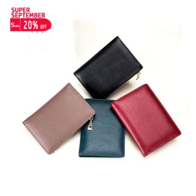 China Slim RFID Mens Passport Wallets Genuine Leather For Men For Women Women 2021 Fashionable Wallet for sale