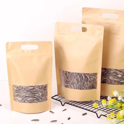 China Customized Recycled Moisture Proof Biodegradable Stand Up Dry Brown Kraft Paper Pouches Food Packaging Bags With Translucent Window for sale