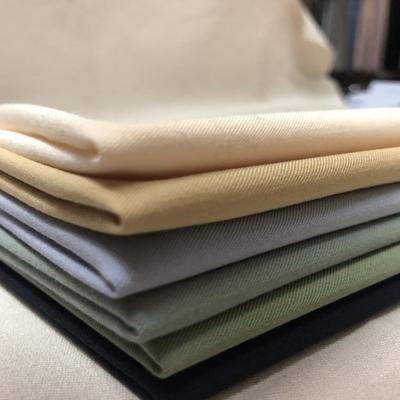 China Stretch Fabric Wove Twill Covering Yarn Material for Clothing Customized Designs Sale for sale